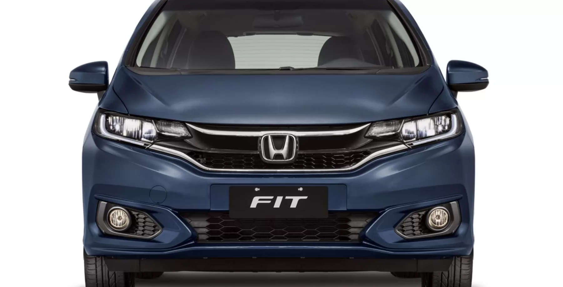 Em 2018, combustível caro e orçamento apertado faziam famílias buscar economia; o Honda Fit EXL respondia com espaço de carro maior.