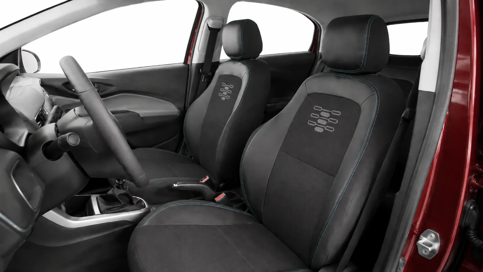 Na frente, o Chevrolet Onix LT 1.0 2019 tem posição de dirigir simples, direção elétrica leve e banco do motorista com ajuste de altura, bom para uso diário e cidade.