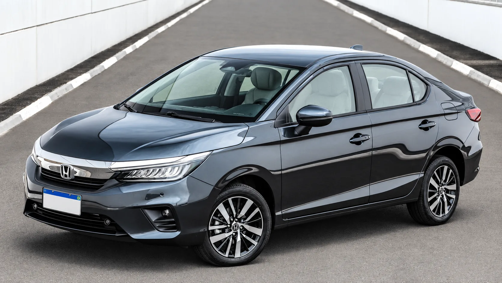 Honda City Touring 2022: Por R$ 99.146, traz Honda Sensing, ACC, frenagem automática e assistente de faixa, num pacote quase sério demais para um carro tão comportado.